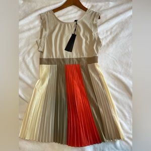 Brand new dress with pleats at waist. Great for a brunch or any *posh* event!
